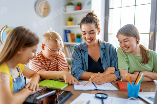 Preview: Happy kids and teacher at school