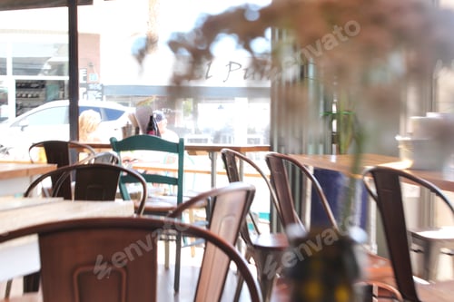 Preview: Indoors of an empty cafe with a lot of natural light