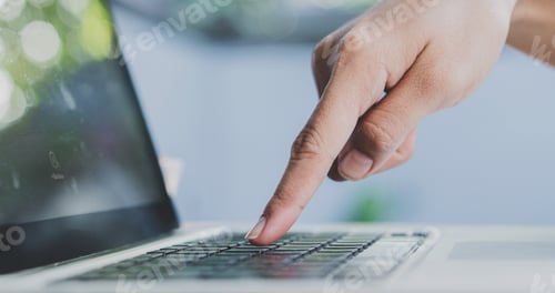 Preview: close up hand working on laptop