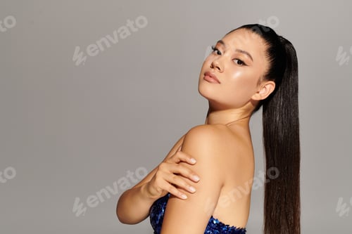 Preview: Stylish woman poses confidently with elegance in a modern fashion studio setting