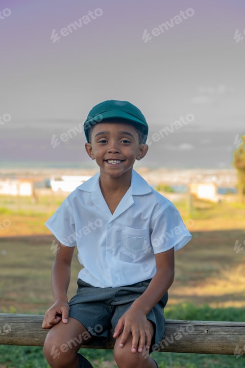 Preview: Portrait of smiling young boy in school uniform