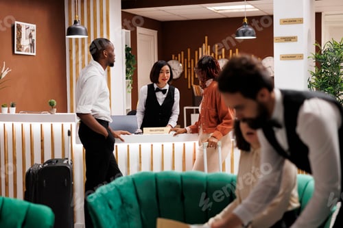 Preview: African american people talking to staff