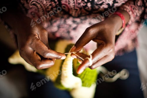 Preview: Closeup shot of a woman making a crochet