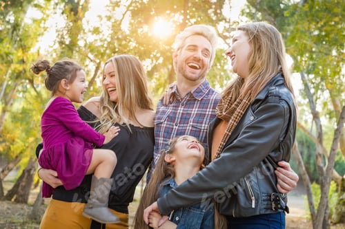 Preview: Mixed Race Family Members Having Fun Outdoors