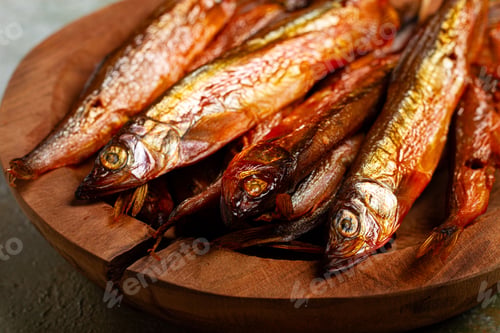 Preview: cold smoked capelin, on a wooden bowl, top view, no people,