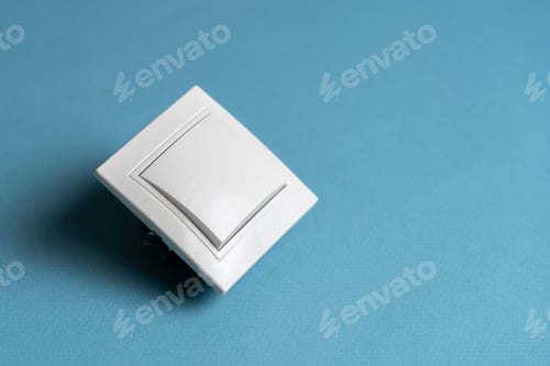 Preview: a white on and off electric light switch at home
