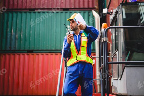 Preview: Industrial engineer worker working at overseas shipping container yard