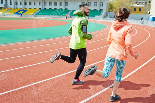Preview: Young couple running