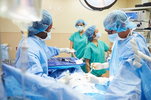 Preview: Surgical Team Working In Operating Theatre