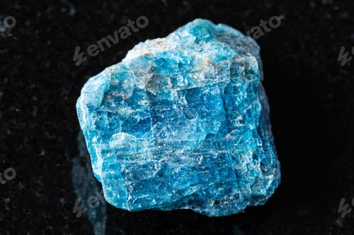 Preview: sample of rough blue apatite mineral on black