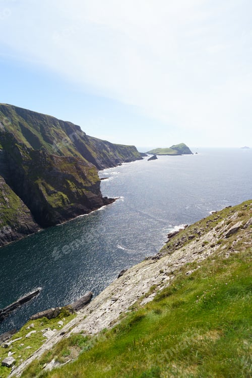Preview: Majestic Irish Cliffs: Azure Skies, Gentle Waves, and Coastal Splendor