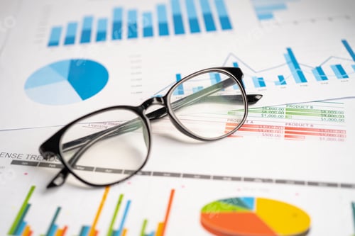 Preview: Eyeglass with calculator on chart graph paper. Finance, account, statistic, investment data economy