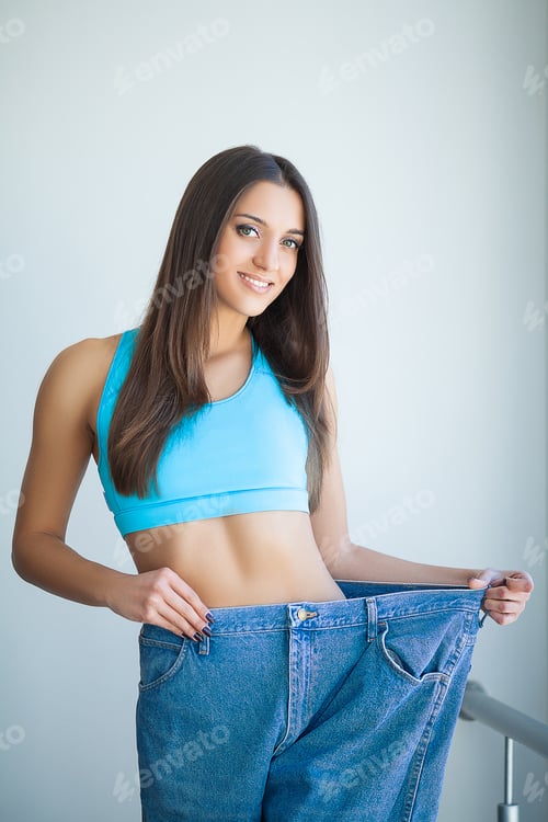 Preview: Beautiful Sporty Woman Showing How Much Weight She Lost