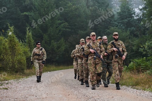 Preview: An elite military unit, led by a major, confidently parades through dense forest, showcasing
