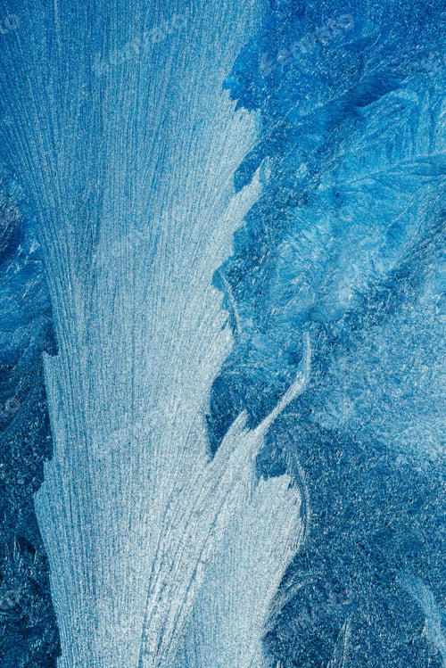 Preview: Contrast frosty pattern on the window, abstract winter background.