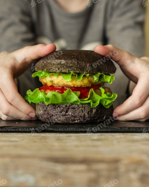 Preview: Burger Black (Bun, Meat, Tomato Sauce And Lettuce). Top Food Background. Copy Space