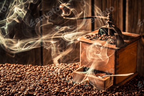 Preview: Taste of fresh coffee beans on dark background