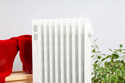 Preview: Concept of heating season, modern electric heater in room