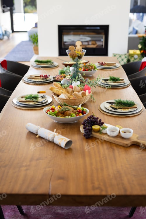 Preview: Close up of table with dinner and decorations at christmas