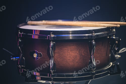 Preview: Close-up, snare drum on a dark background isolated, copy space.