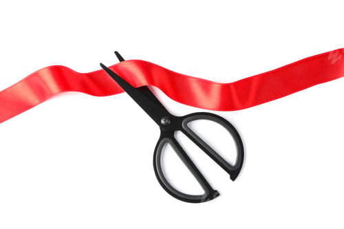 Preview: Red ribbon and scissors isolated on white background. Gift concept
