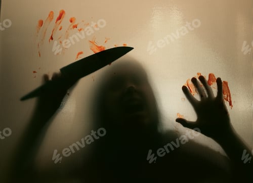 Preview: Woman killer with a knife in her hand and blood. Creepy background