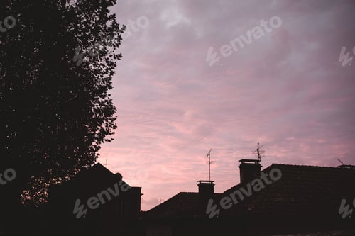 Preview: Silhouette of houses in evening