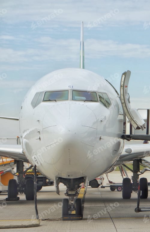 Preview: Airplane standing on the ground.