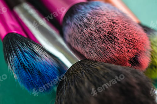Preview: Makeup brush isolated on green background