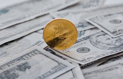 Preview: Shot of a coin and a wad of cash against a grey background