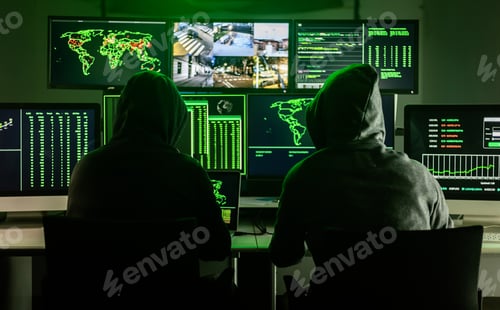 Preview: Hackers working on computers showing world maps and security camera footage