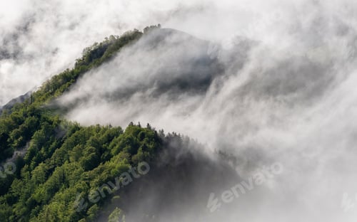 Preview: Fog rolling over hills at sunrise