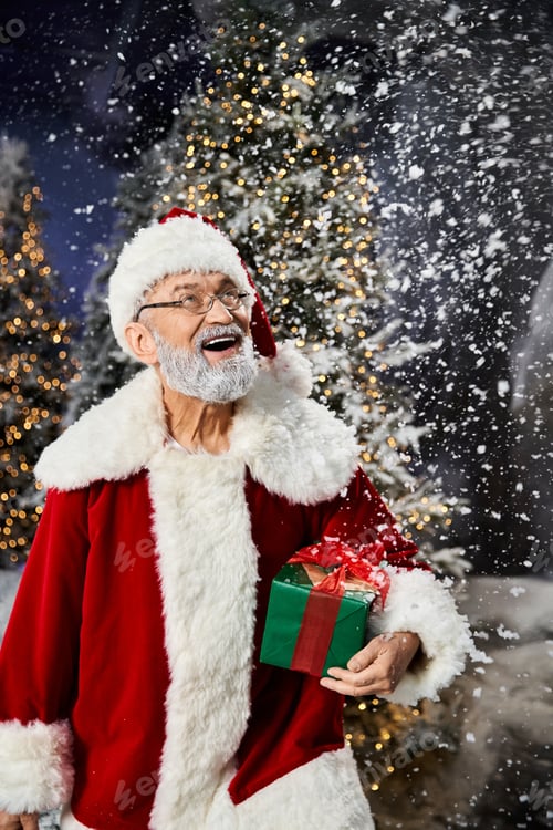 Preview: A cheerful Santa celebrates the holiday season amidst snowflakes and twinkling lights