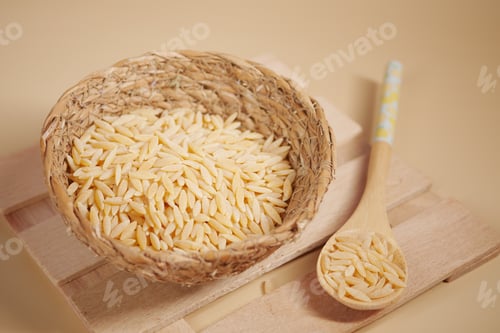 Preview: Wooden bowl with white long rice basmati.