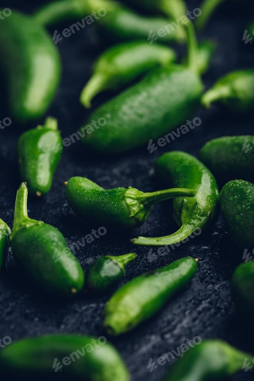 Preview: Ripe Green Jalapeno Peppers on Concrete Background