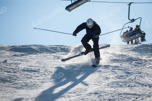 Preview: Skier in the moment of falling on the snowy slope