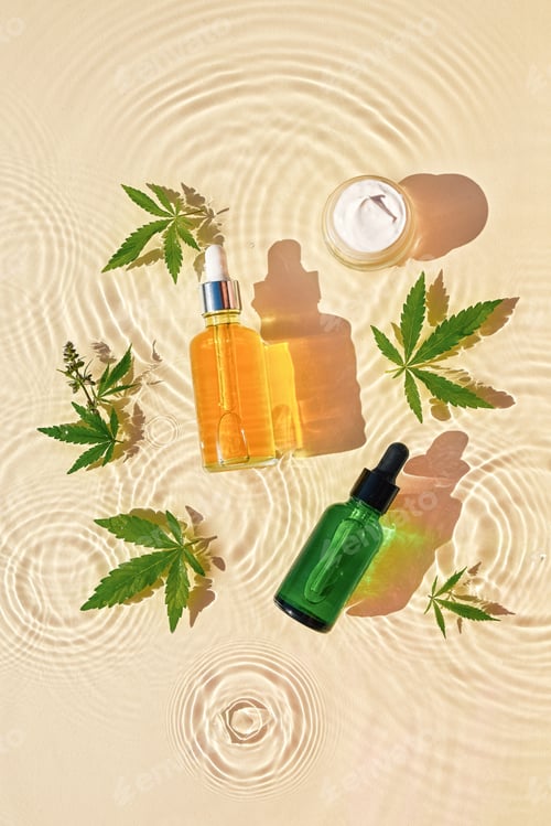 Preview: CBD oil cosmetics in jar, bottle with cannabis leaves, drops