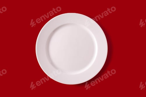 Preview: White plate on red background