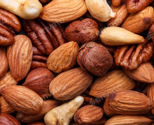 Preview: Background texture of assorted mixed nuts including cashew, peca