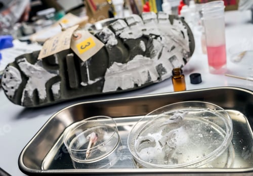Preview: Shoe with cement footprints analyzed in crime lab, crime evidence, conceptual image