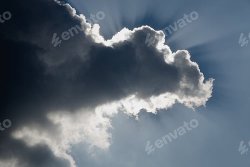 Preview: Beautiful cloudscape over horizon. Sun hide behind cloud. Deep blue sky