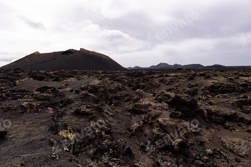 Preview: scenery view of volcano Cuervo and rough mountains