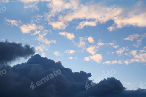 Preview: Horizontal photograph of blue clouds in overcast weather at sunset. Smoke.