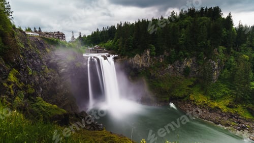 Preview: Mesmerizing display of the Snoqualmie Falls waterfall surrounded by green vegetation