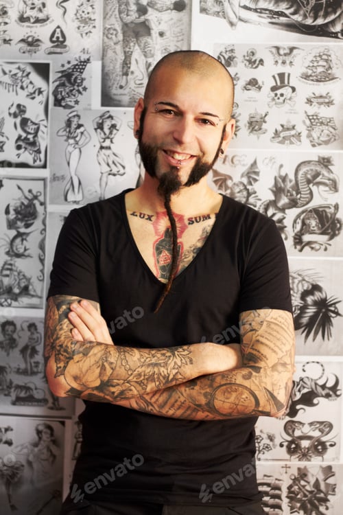 Preview: Ink Me. Shot of a youngm an with tattoos.