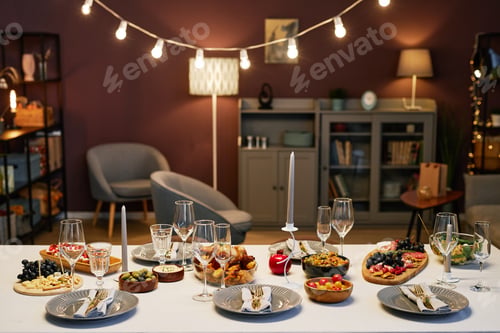 Preview: Part of large dinner table with variety of homemade food prepared for guests