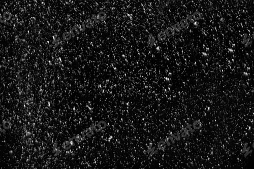 Preview: Snow flakes falling on black background. Winter weather