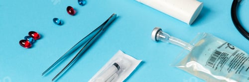 Preview: The close-up shot of a medical instruments lying on a blue background