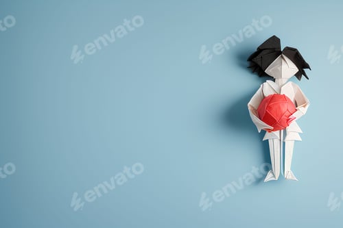 Preview: Origami female holding an intricately crafted origami paper ball in her hands