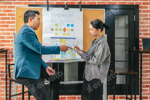 Preview: Professional Colleagues Brainstorming Ideas in a Modern Collaborative Workspace